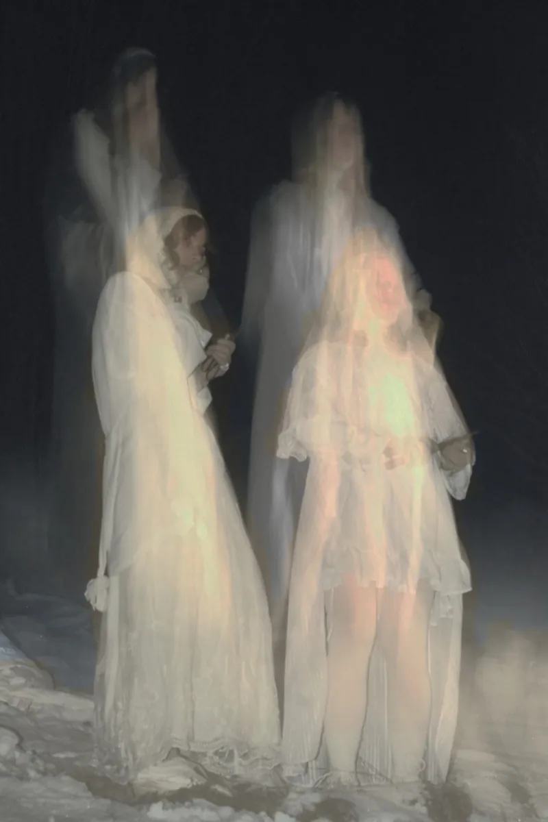 A variant of the same scene with iridescent patches of colour on the dresses and a cooler navy background